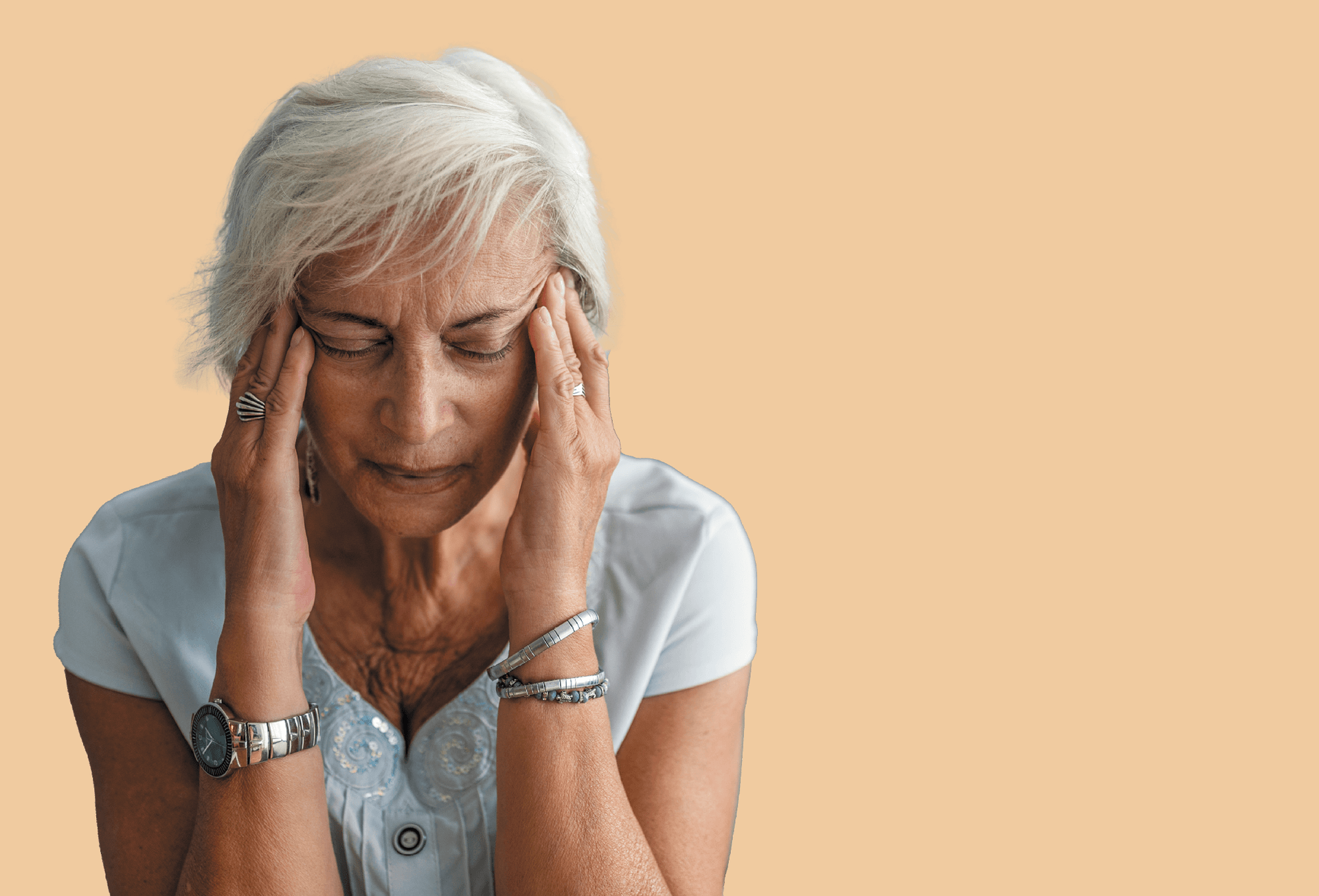Woman struggling with a migraine