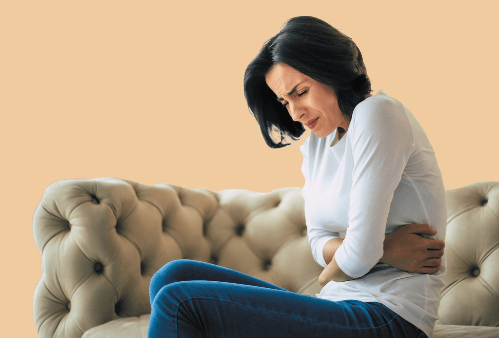 Woman with UTI stomach pains